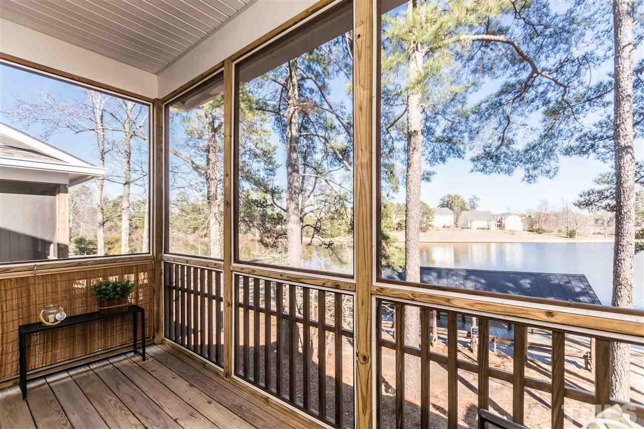 1317 Silver Beach Way Raleigh, NC 27606 - Photo 6 of 24 a view of a balcony with wooden floor
