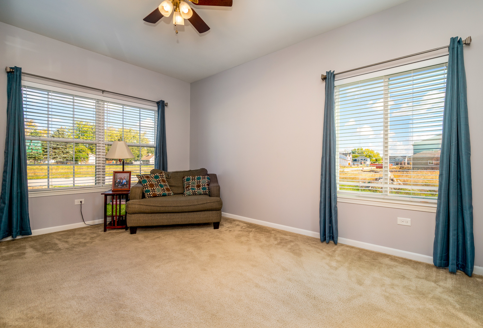 1604 Edentenny Road New Lenox, IL 60451 - Photo 16 of 37 a living room with furniture and a chandelier