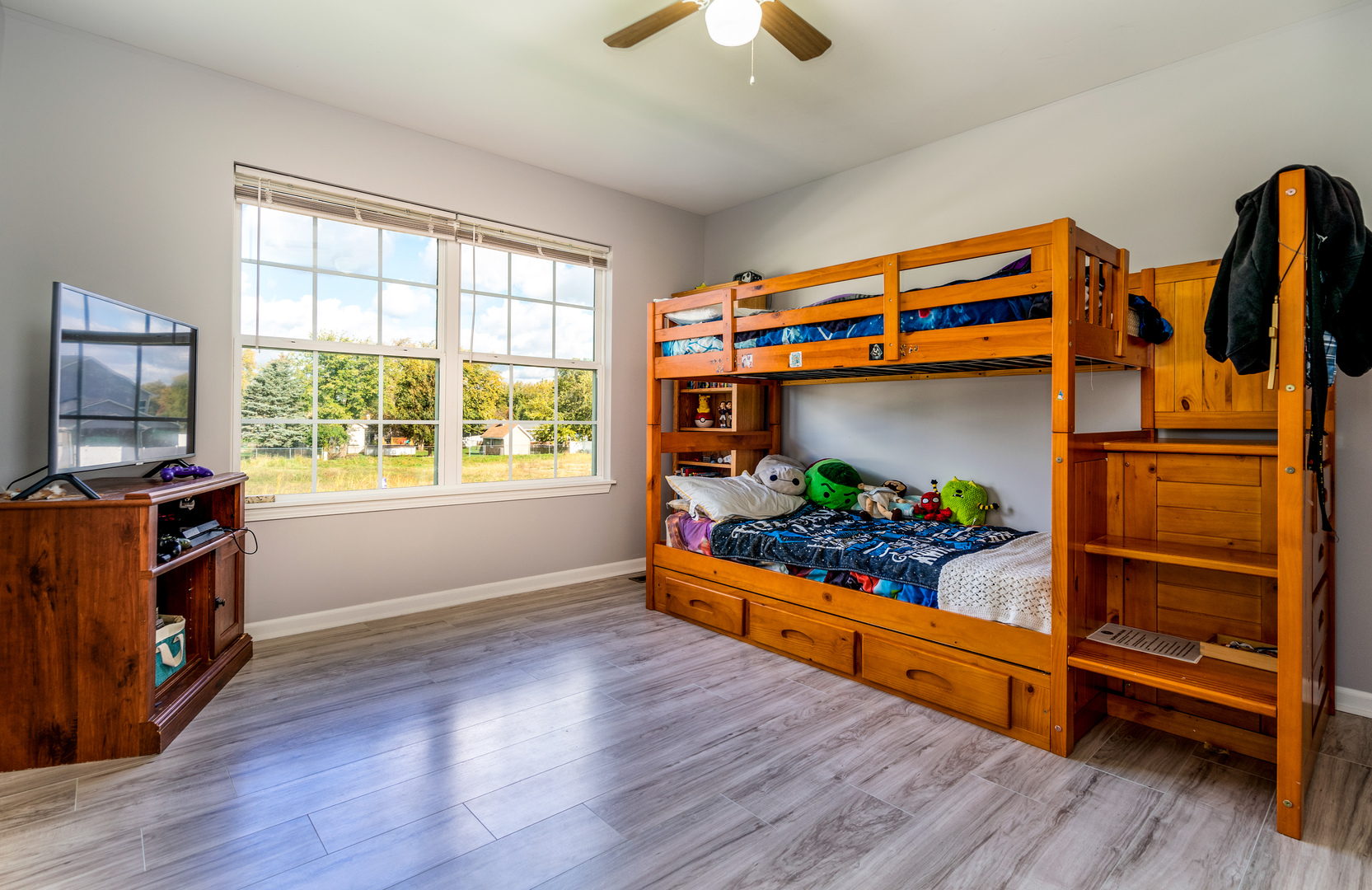 1604 Edentenny Road New Lenox, IL 60451 - Photo 22 of 37 wooden floor in an empty room with a window and wooden floor