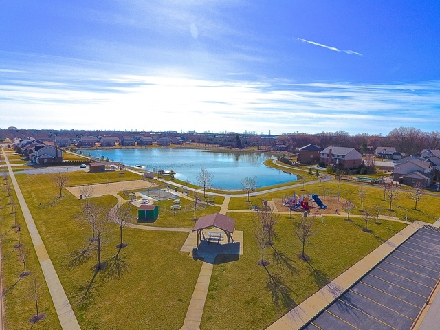 1604 Edentenny Road New Lenox, IL 60451 - Photo 36 of 37 a view of a swimming pool with an ocean view