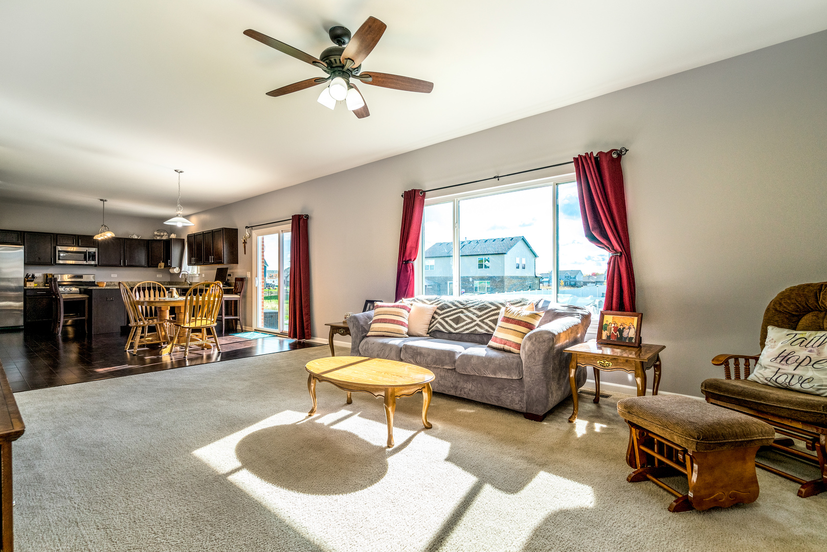 1604 Edentenny Road New Lenox, IL 60451 - Photo 10 of 37 a living room with furniture and a large window
