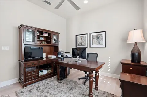 a view of a workspace with furniture
