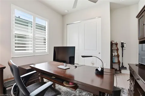 a view of a workspace with furniture