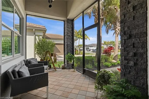 a lobby with furniture and outdoor space