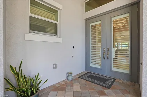 a view of a entryway with wooden floor