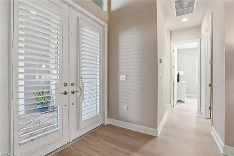 a view of a bathroom with wooden floor