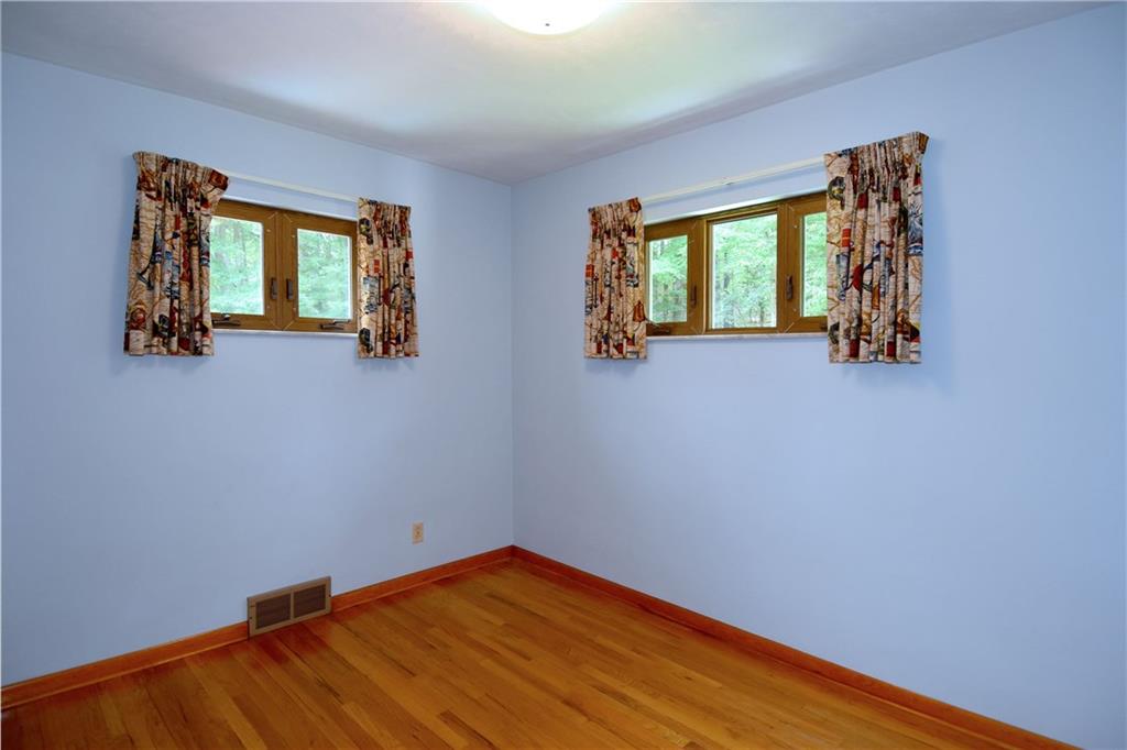 186 McIntyre Road Pittsburgh, PA 15237 - Photo 11 of 25 This bedroom gives us a glance of the gleaming hardwood!