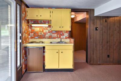 186 McIntyre Road Pittsburgh, PA 15237 - Photo 17 of 25 This kitchenette is in the game room area and the glass doors will take you to the patio.