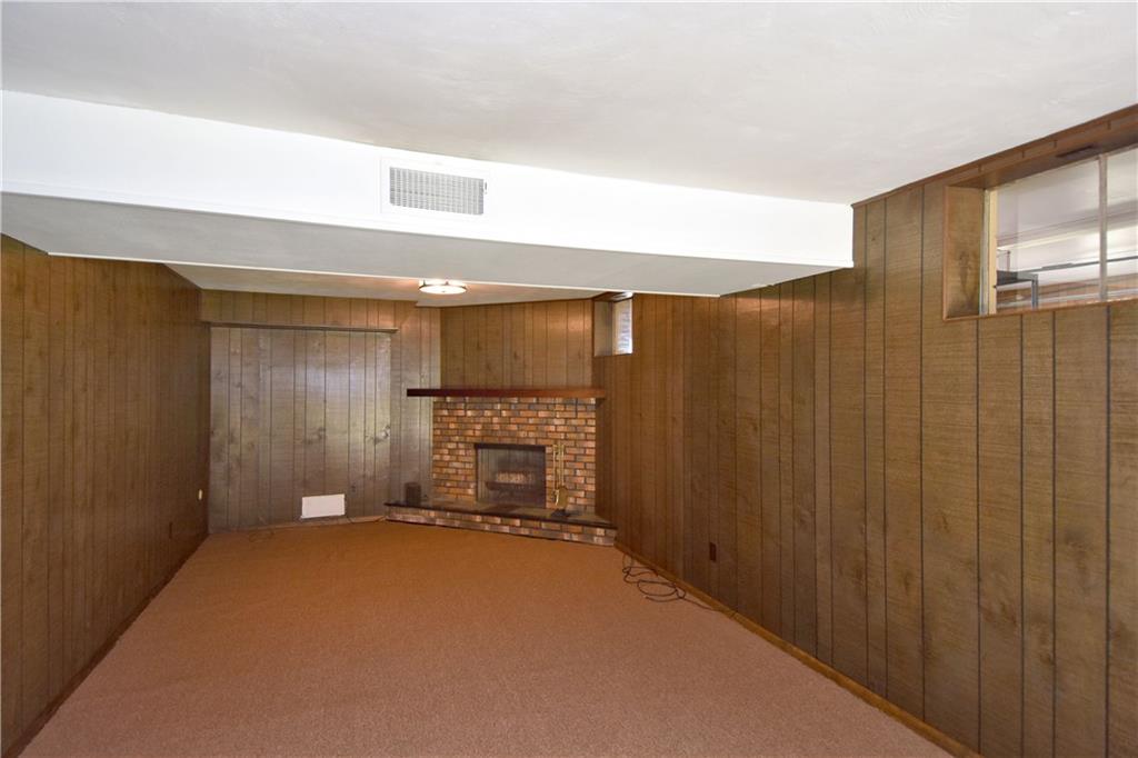 186 McIntyre Road Pittsburgh, PA 15237 - Photo 19 of 25 This is a log burning fireplace in the rear of the game-room. Great man cave!