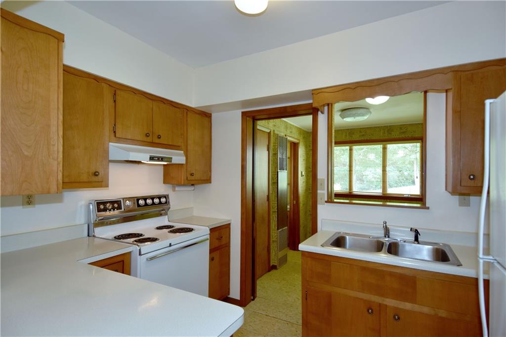 186 McIntyre Road Pittsburgh, PA 15237 - Photo 7 of 25 Adjoining the kitchen is a first floor laundry with plumbing connections or as currently used as a breakfast nook.