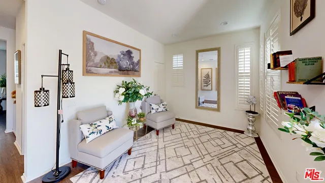 a utility room with sink dryer and washer