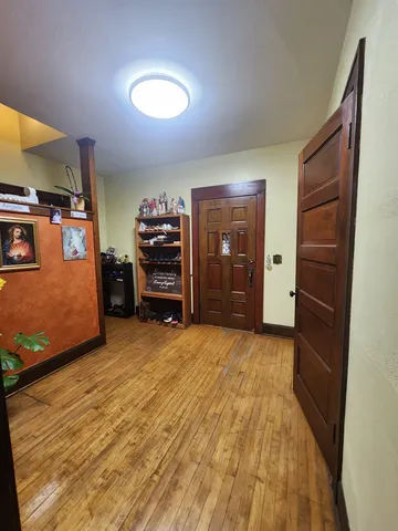 a view of a livingroom with furniture and storage