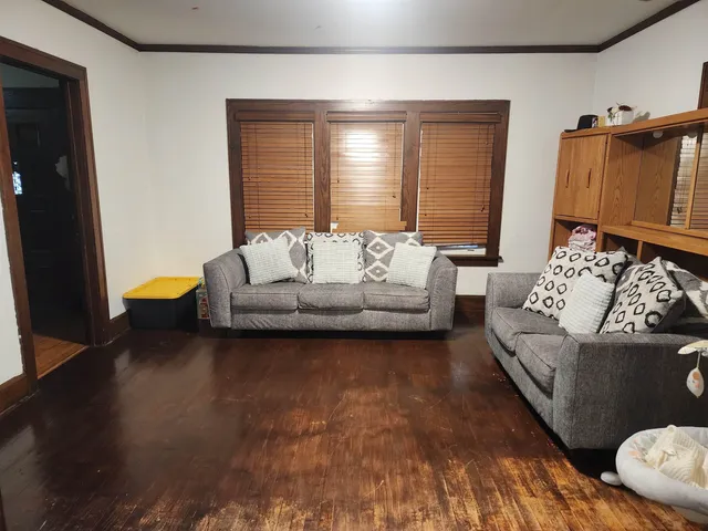 a living room with furniture and a couch