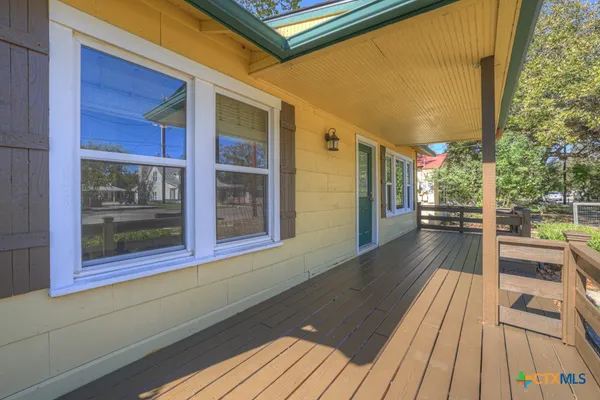 a view of a house with a patio