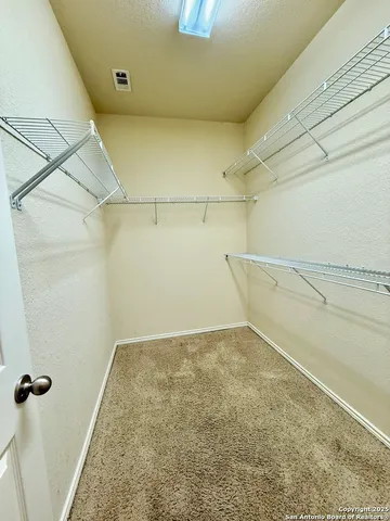 a view of a room with empty racks