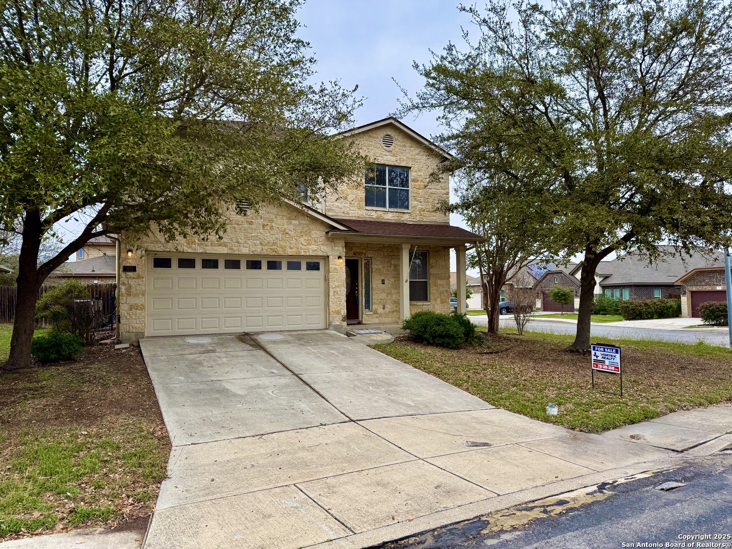 7015 Laguna Beach Converse, TX 78109 - Photo 2 of 39 a front view of a house with garden