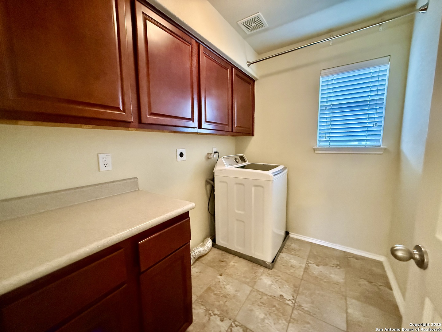 7015 Laguna Beach Converse, TX 78109 - Photo 26 of 39 a utility room with dryer and washer