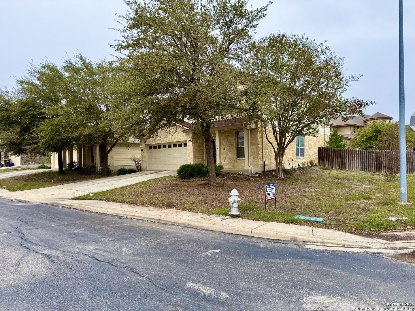 7015 Laguna Beach Converse, TX 78109 - Photo 3 of 39 a view of outdoor space yard and tree