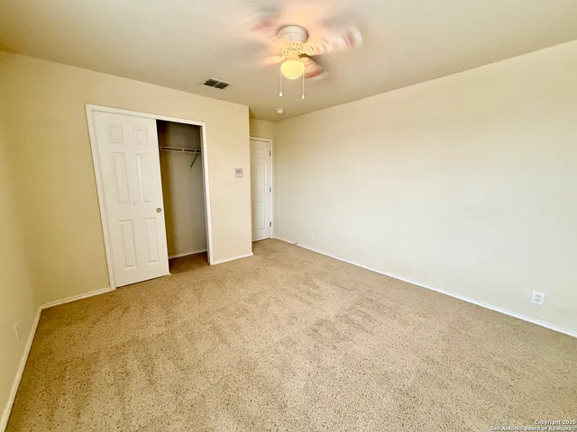 a bathroom with a vanity and a mirror