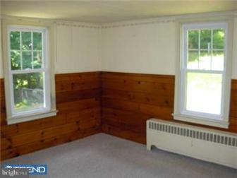 108 Clearfield Lane Sinking Spring, PA 19608 - Photo 8 of 11 a view of an empty room with a window