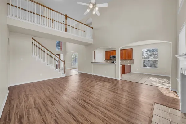 a view of an entryway with wooden floor