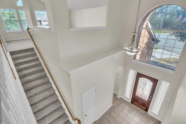 a view of an entryway with staircase