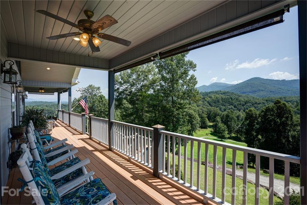 280 Robinson Gap Road Bryson City, NC 28713 - Photo 8 of 36 a view of a balcony with furniture
