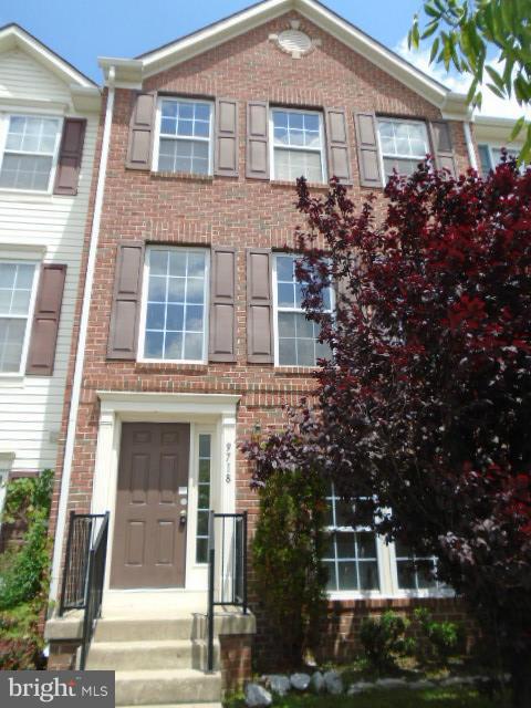 9718 Luguna Road Middle River, MD 21220 - Photo 1 of 29 front view of house with a street sign