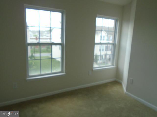 9718 Luguna Road Middle River, MD 21220 - Photo 13 of 29 an empty room with a window