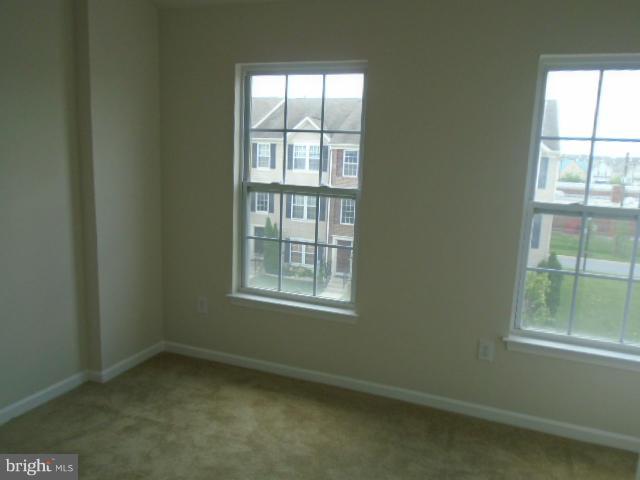 9718 Luguna Road Middle River, MD 21220 - Photo 15 of 29 an empty room with a window