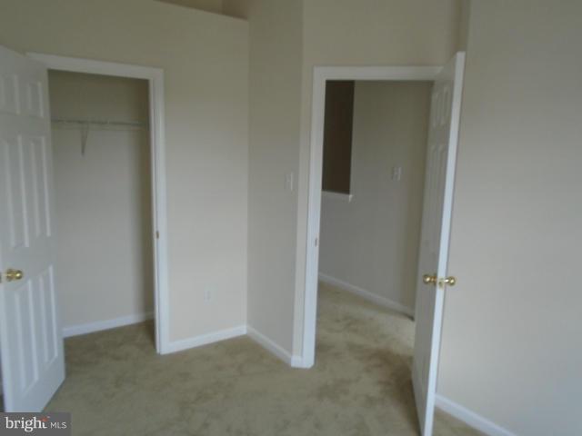 9718 Luguna Road Middle River, MD 21220 - Photo 18 of 29 an empty room with closet