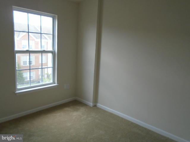 9718 Luguna Road Middle River, MD 21220 - Photo 19 of 29 an empty room with a window