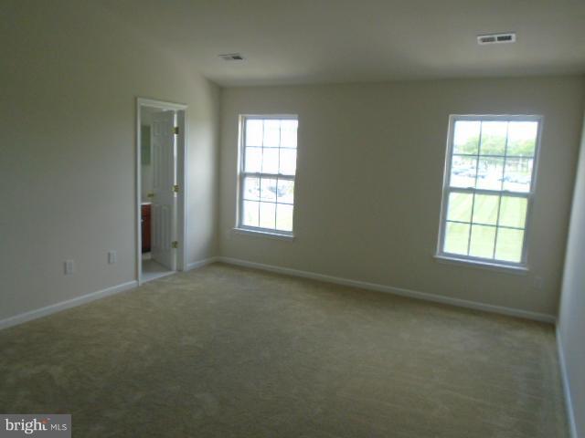 9718 Luguna Road Middle River, MD 21220 - Photo 22 of 29 an empty room with windows