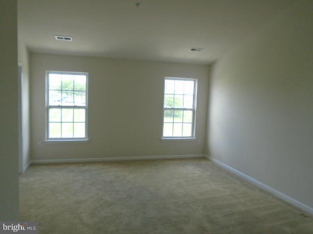 9718 Luguna Road Middle River, MD 21220 - Photo 24 of 29 an empty room with a window