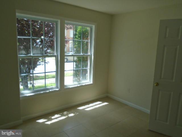 9718 Luguna Road Middle River, MD 21220 - Photo 26 of 29 a view of empty room with window