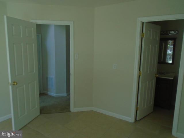 9718 Luguna Road Middle River, MD 21220 - Photo 27 of 29 an empty room with closet