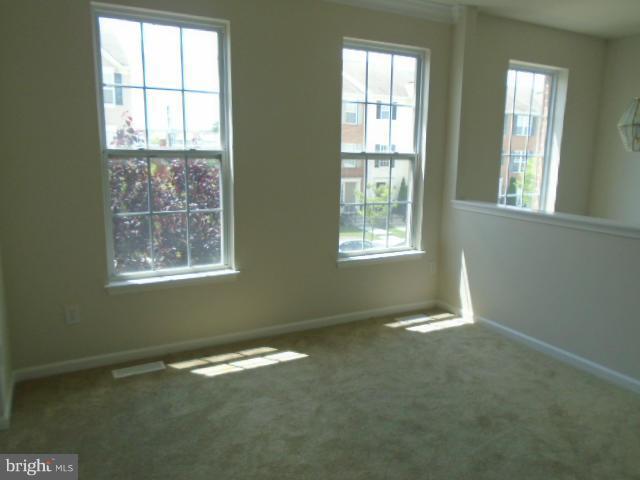 9718 Luguna Road Middle River, MD 21220 - Photo 4 of 29 an empty room with a window