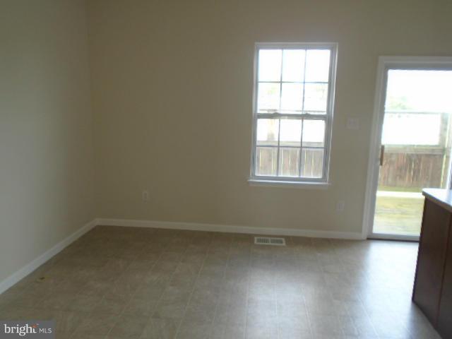 9718 Luguna Road Middle River, MD 21220 - Photo 8 of 29 an empty room with a window