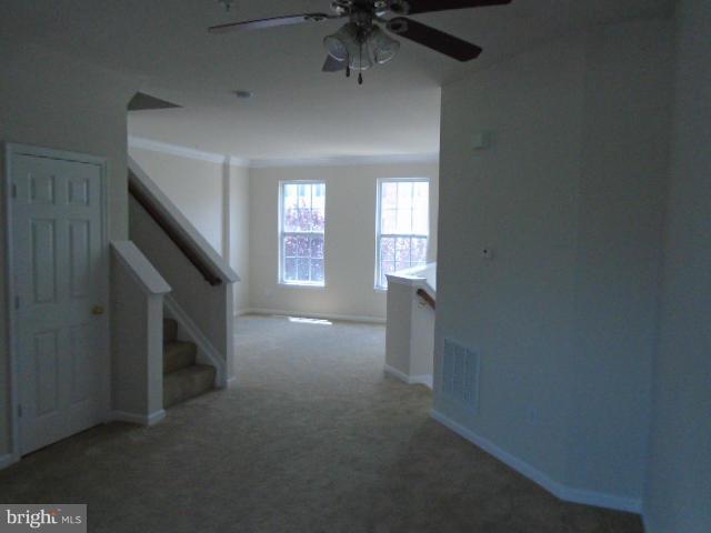 9718 Luguna Road Middle River, MD 21220 - Photo 9 of 29 a view of empty room with fireplace and window