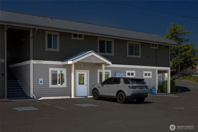 a car parked in front of a house