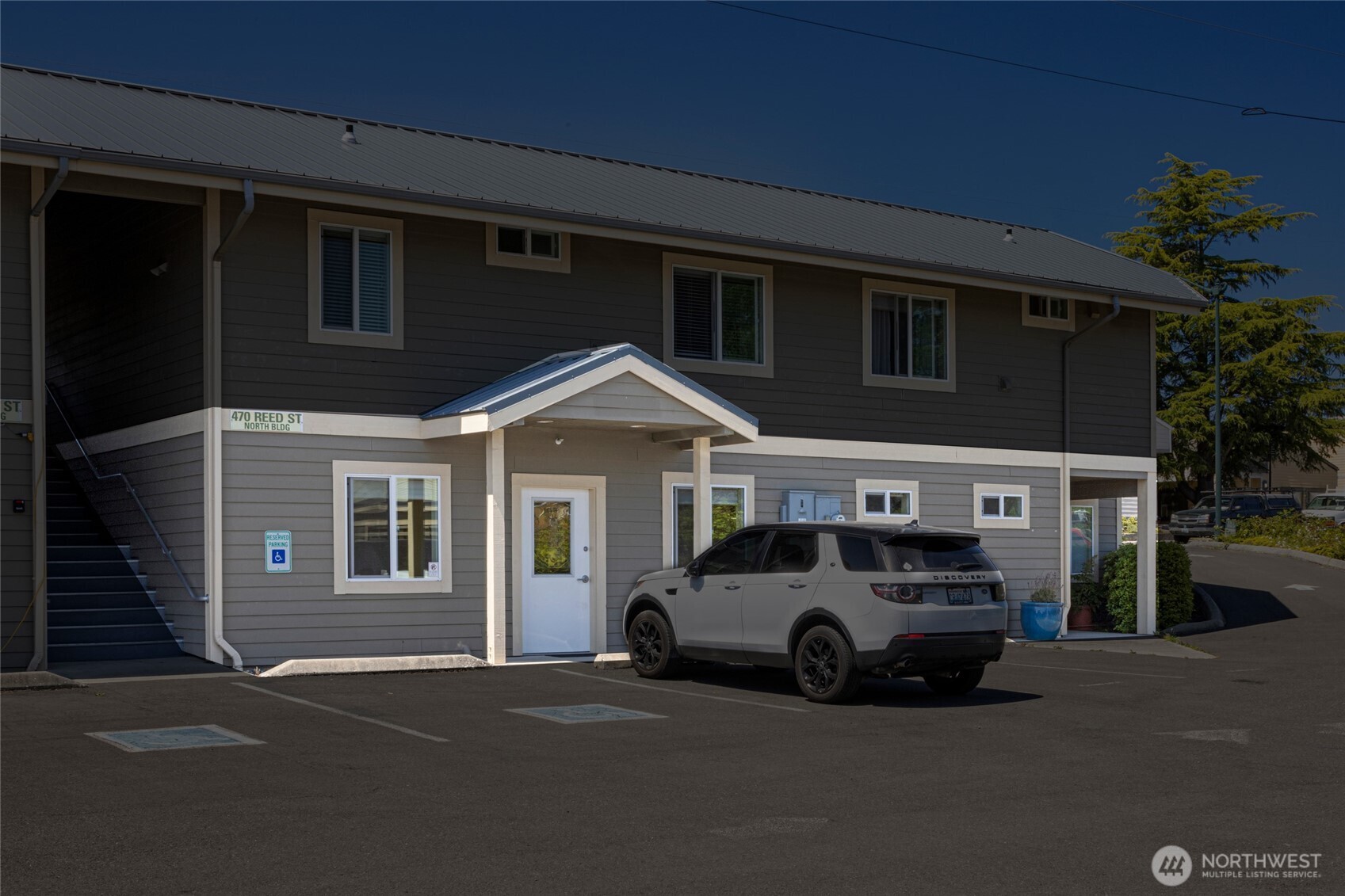 470 Reed Street, Unit 2 Friday Harbor, WA 98250 - Photo 17 of 29 a car parked in front of a house