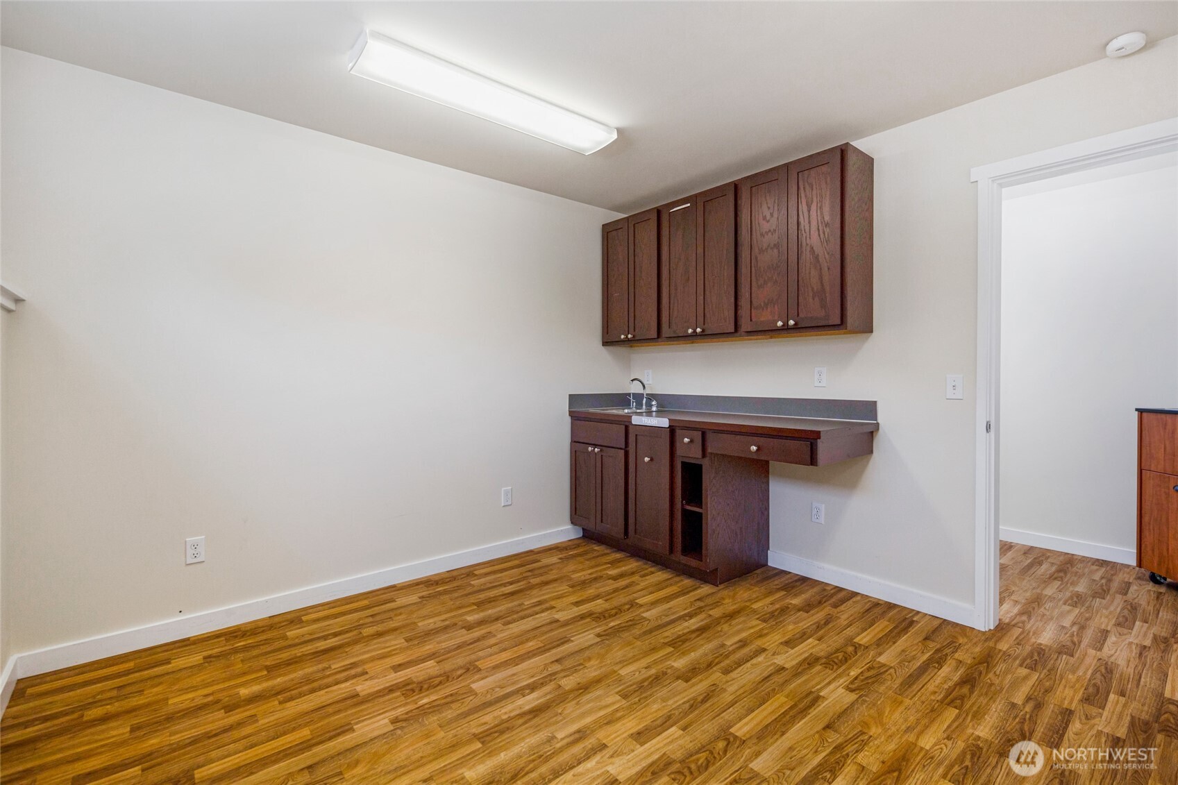 470 Reed Street, Unit 2 Friday Harbor, WA 98250 - Photo 25 of 29 a kitchen with a sink and a stove top oven