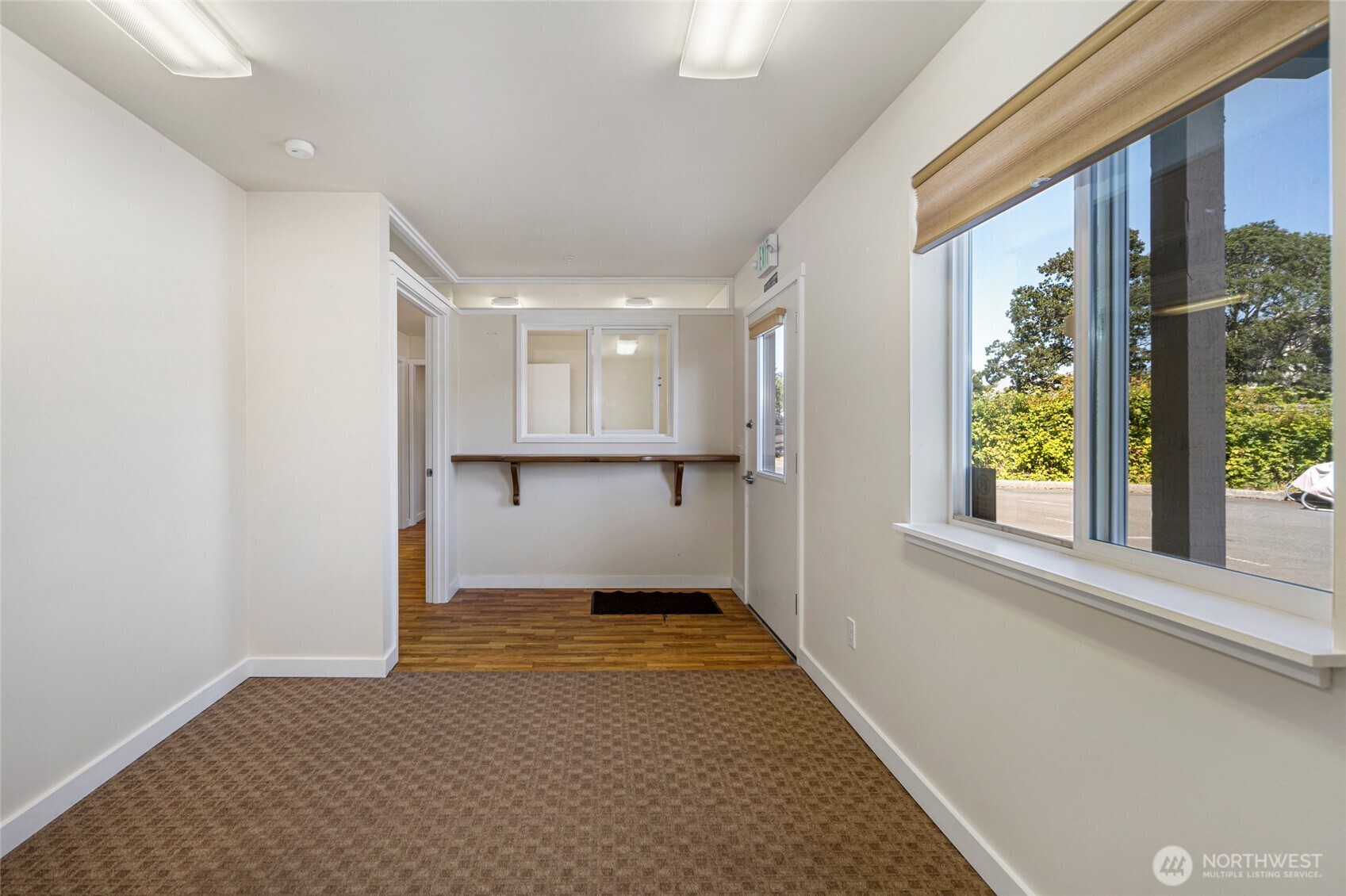 470 Reed Street, Unit 2 Friday Harbor, WA 98250 - Photo 27 of 29 a view of a kitchen with a refrigerator and a window