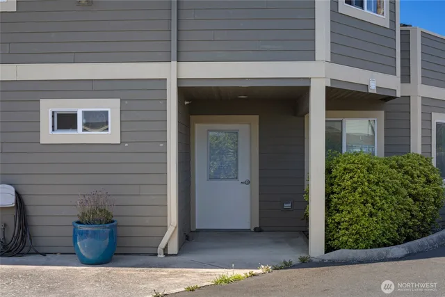 a view of a potted plants in front of a door
