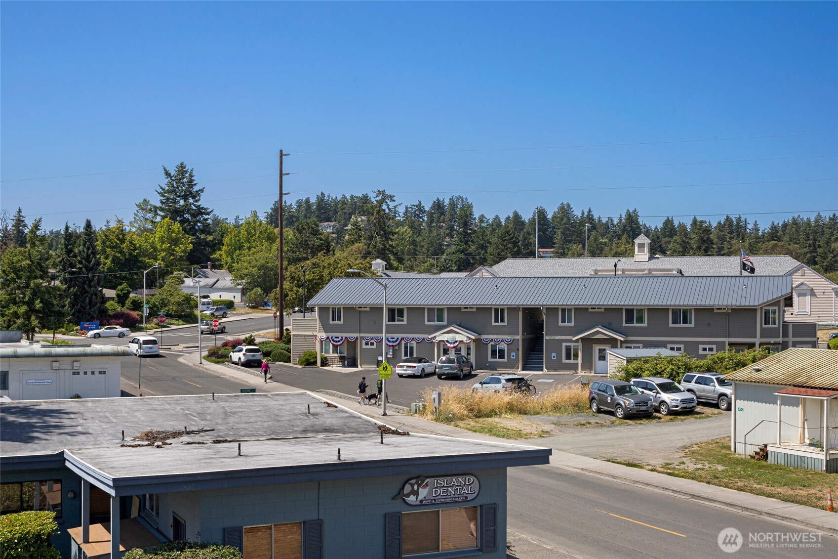 470 Reed Street, Unit 2 Friday Harbor, WA 98250 - Photo 5 of 29 a view of a house with swimming pool and sitting area