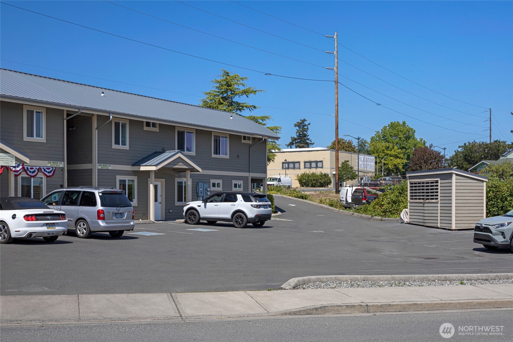 470 Reed Street, Unit 2 Friday Harbor, WA 98250 - Photo 6 of 29 a car parked in front of a house