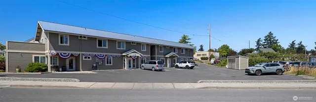 a view of car parked in front of house