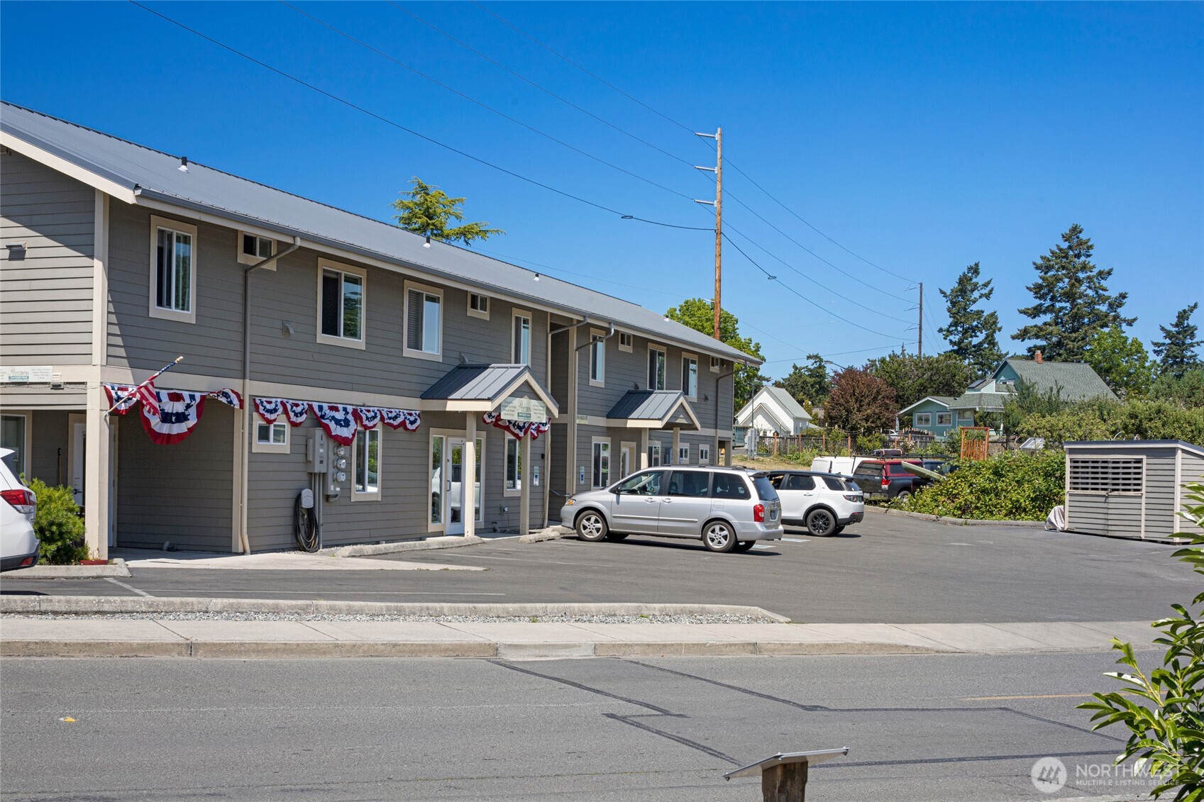 470 Reed Street, Unit 2 Friday Harbor, WA 98250 - Photo 8 of 29 a car parked in front of a building