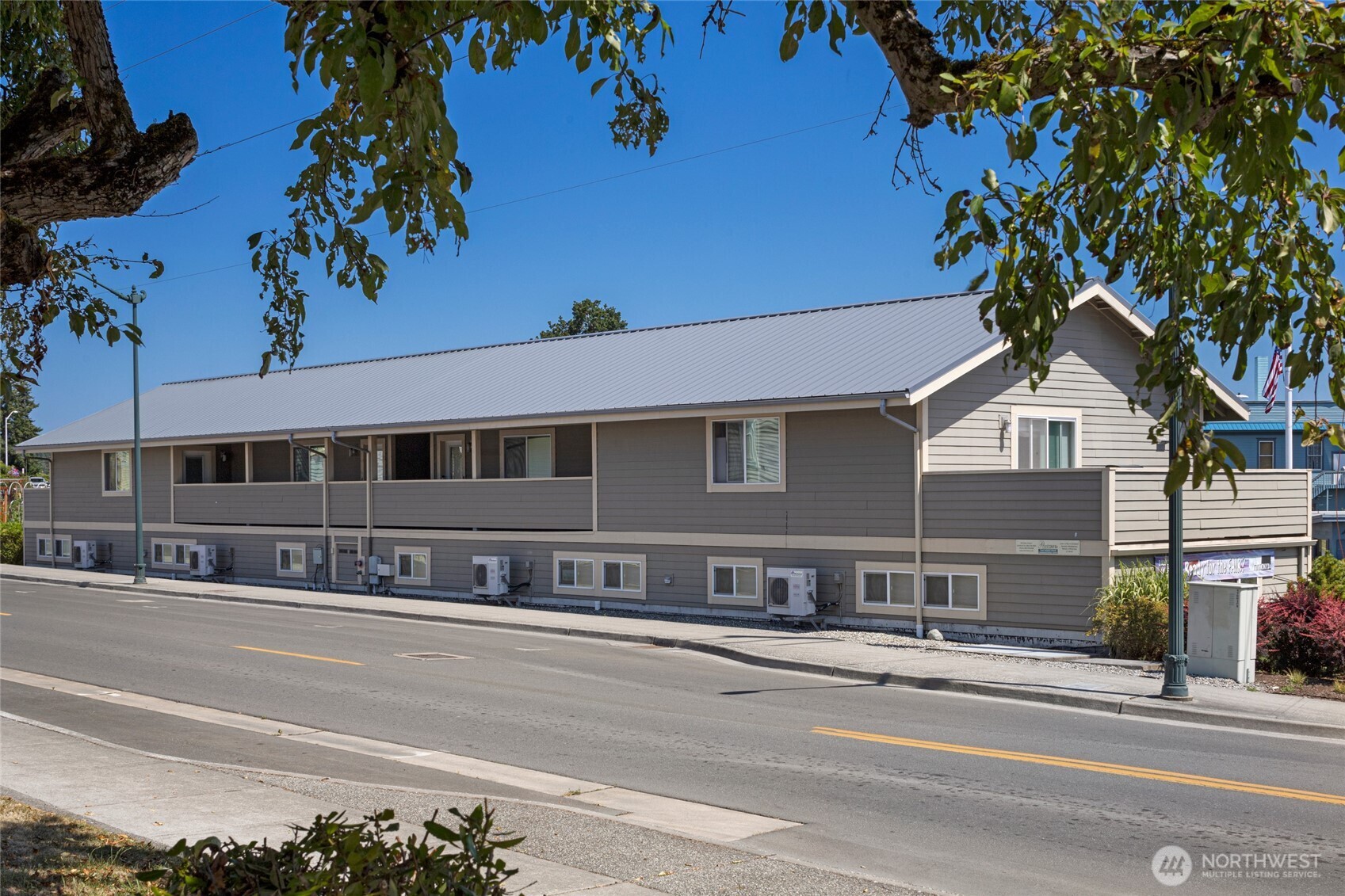 470 Reed Street, Unit 2 Friday Harbor, WA 98250 - Photo 10 of 29 a front view of a house with a tree