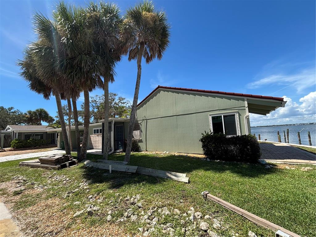 2985 North Beach Road, Unit C71 Englewood, FL 34223 - Photo 15 of 23 a house view with a garden space